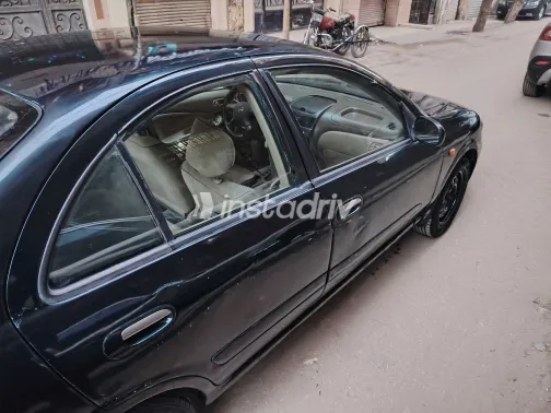 نيسان صنى 2006 أبيض مستعملة للبيع - 9