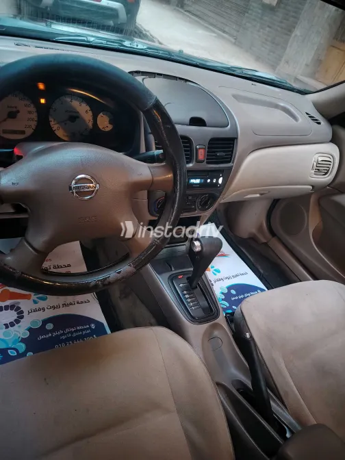 نيسان صنى 2006 أبيض مستعملة للبيع - 10