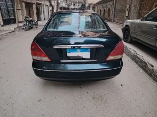 نيسان صنى 2006 أبيض مستعملة للبيع