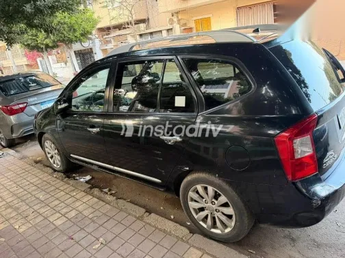 كيا كارينز 2013 أسود مستعملة للبيع - 2