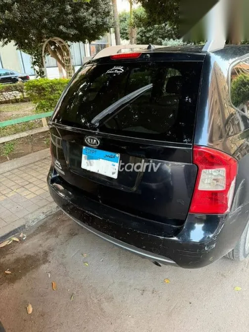 كيا كارينز 2013 أسود مستعملة للبيع - 4