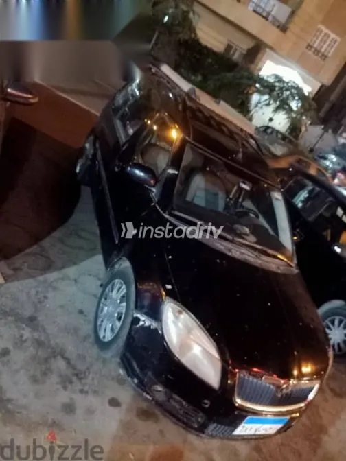 سكودا رومستر 2010 أسود مستعملة للبيع - 2
