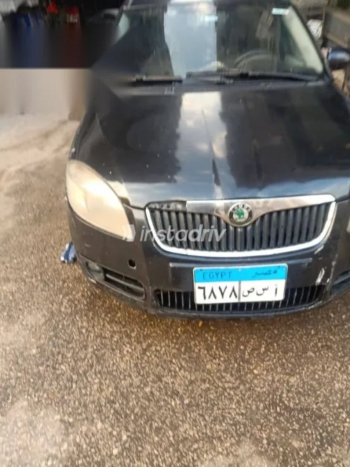 سكودا رومستر 2010 أسود مستعملة للبيع - 4