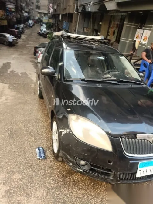 سكودا رومستر 2010 أسود مستعملة للبيع - 5