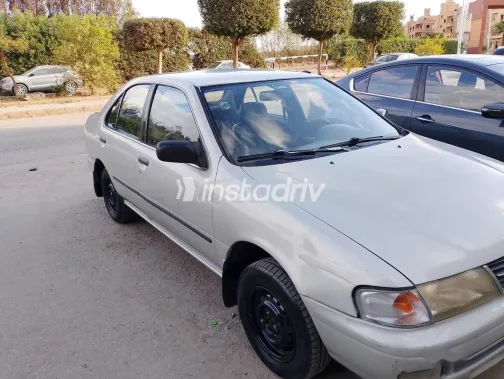 نيسان صنى 1997 فضي مستعملة للبيع - 3