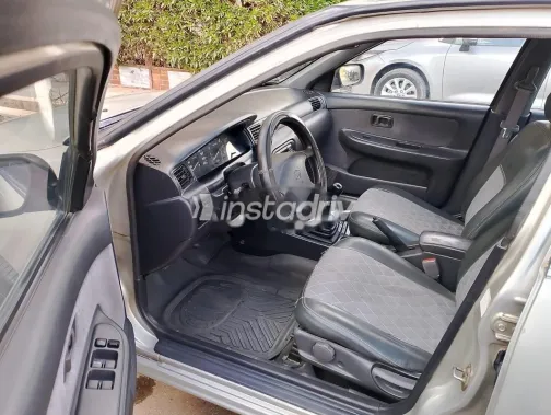 نيسان صنى 1997 فضي مستعملة للبيع - 5