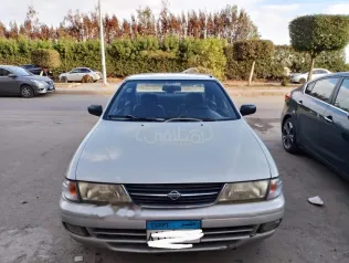 نيسان صنى 1997 فضي مستعملة للبيع