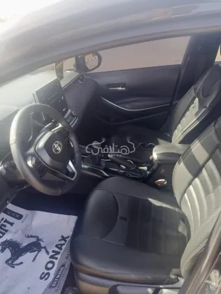 تويوتا كورولا 2022 أسود مستعملة للبيع