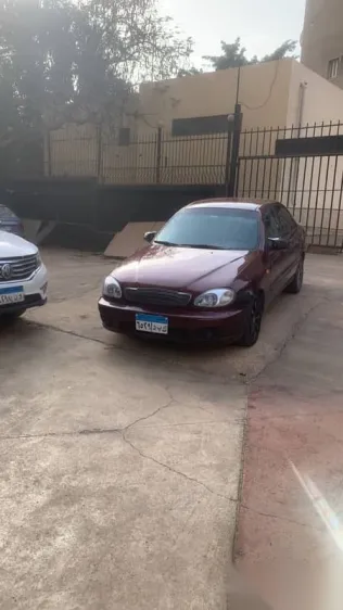 شيفروليه لانوس 2012 أحمر مستعملة للبيع