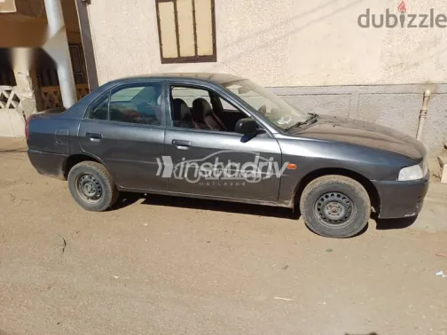ميتسوبيشي لانسر 1998 رمادي مستعملة للبيع - 2