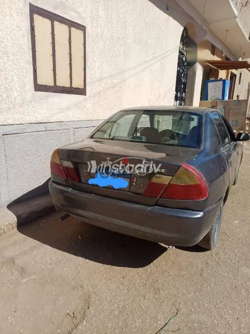 ميتسوبيشي لانسر 1998 رمادي مستعملة للبيع - 3