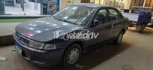 ميتسوبيشي لانسر 1998 رمادي مستعملة للبيع - 5