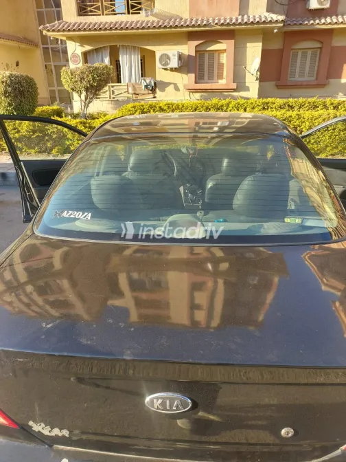 كيا سبكترا 2004 أبيض مستعملة للبيع - 2