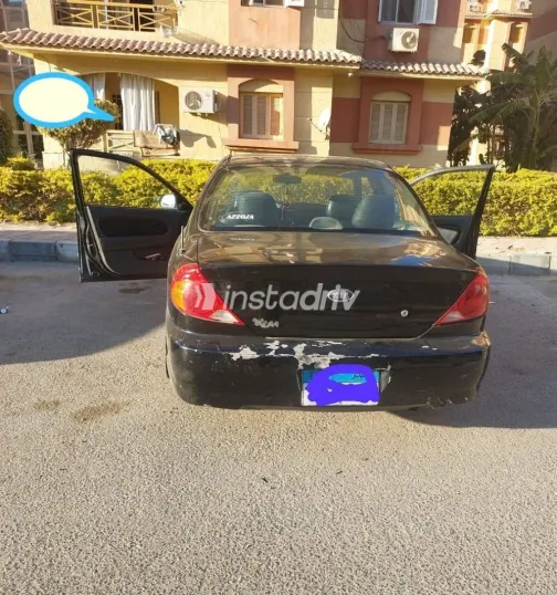 كيا سبكترا 2004 أبيض مستعملة للبيع - 3