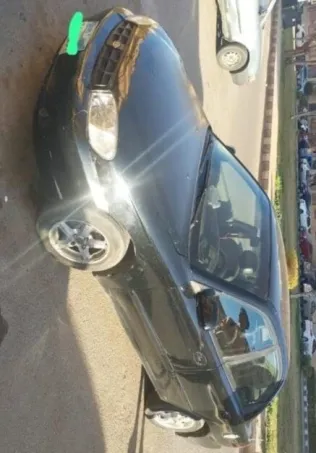 كيا سبكترا 2004 أبيض مستعملة للبيع