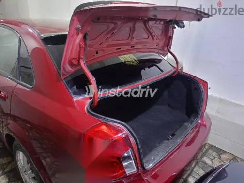 Chevrolet Optra 2013 Burgundy Used for Sale - 5