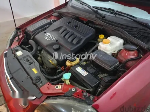 Chevrolet Optra 2013 Burgundy Used for Sale - 9