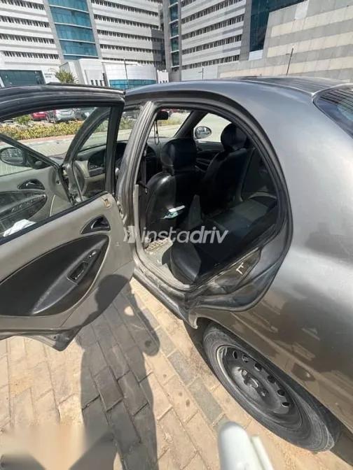 دايو نوبيرا 2003 بني مستعملة للبيع - 3