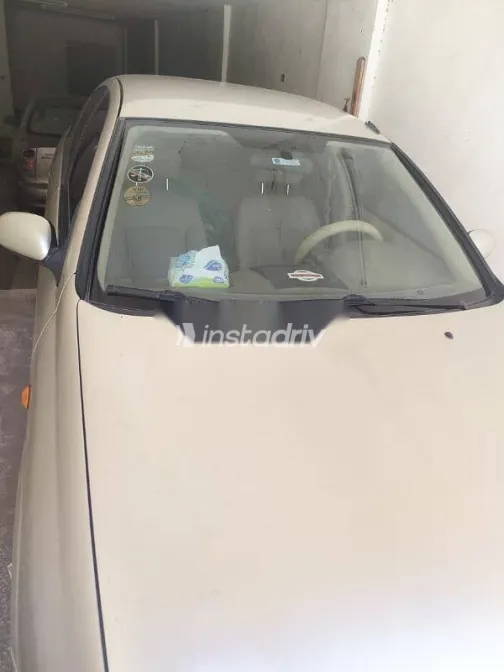 نيسان صنى 2005 ذهبي مستعملة للبيع - 2