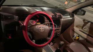 تويوتا افانزا 2008 أحمر غامق مستعملة للبيع