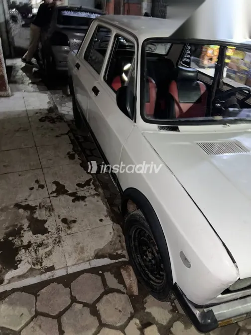 فيات 128 1985 أبيض مستعملة للبيع - 1