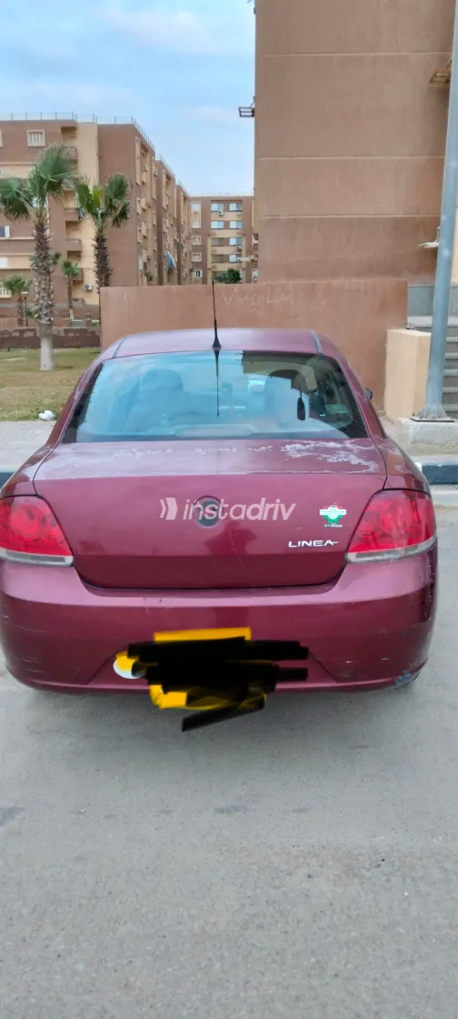 فيات لينيا 2013 أبيض مستعملة للبيع - 7