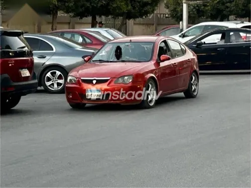 بروتون جين 2 2008 برتقالي مستعملة للبيع - 1