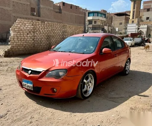 بروتون جين 2 2008 برتقالي مستعملة للبيع - 7