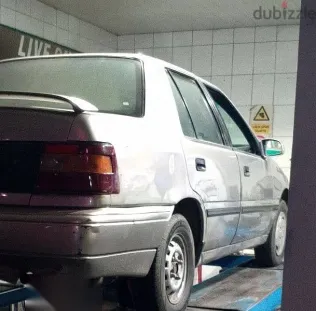 هيونداي اكسيل 1998 ذهبي مستعملة للبيع