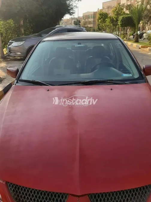 ميتسوبيشي لانسر بومة 2008 أحمر غامق مستعملة للبيع - 1