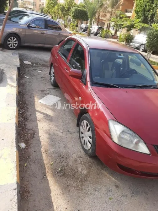 ميتسوبيشي لانسر بومة 2008 أحمر غامق مستعملة للبيع - 2