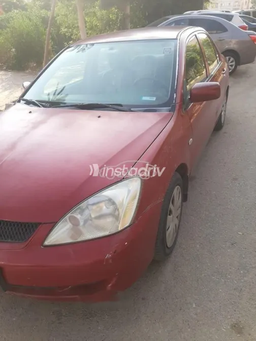 ميتسوبيشي لانسر بومة 2008 أحمر غامق مستعملة للبيع - 3