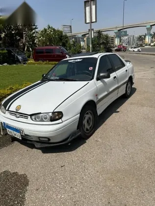 هيونداي إلنترا 1994 أبيض مستعملة للبيع