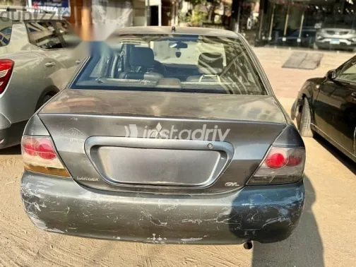 ميتسوبيشي لانسر 2007 رمادي مستعملة للبيع - 1