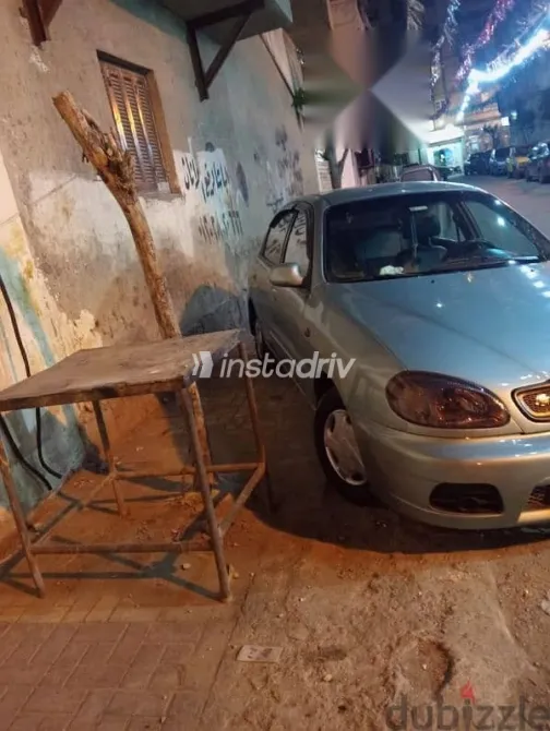 دايو لانوس 2006 أبيض مستعملة للبيع - 2