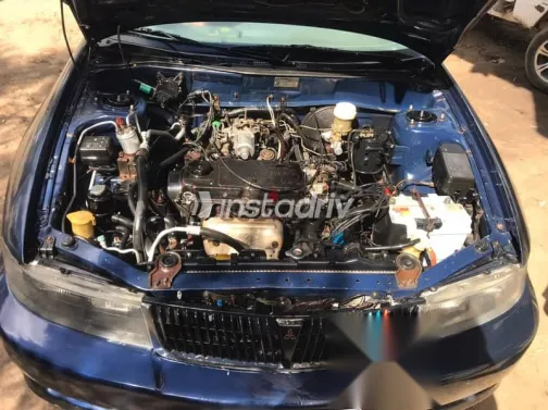 ميتسوبيشي لانسر 1999 أزرق غامق مستعملة للبيع - 1