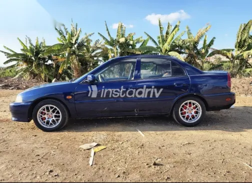 ميتسوبيشي لانسر 1999 أزرق غامق مستعملة للبيع - 2