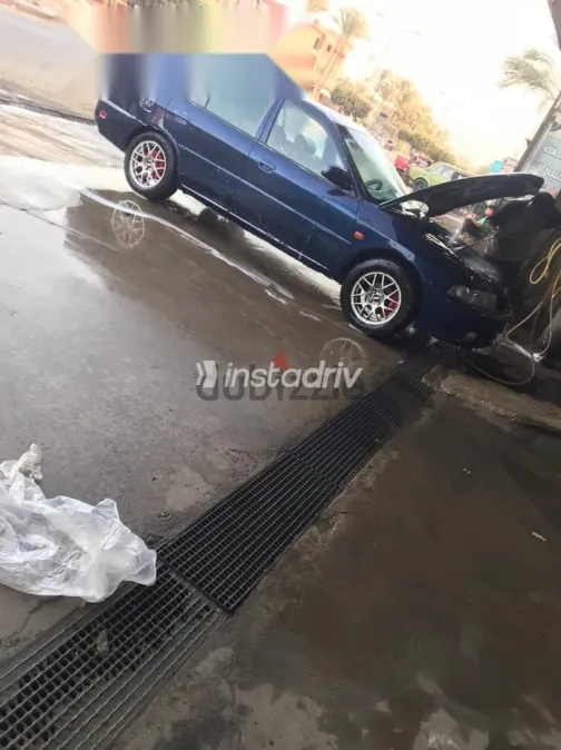 ميتسوبيشي لانسر 1999 أزرق غامق مستعملة للبيع - 4