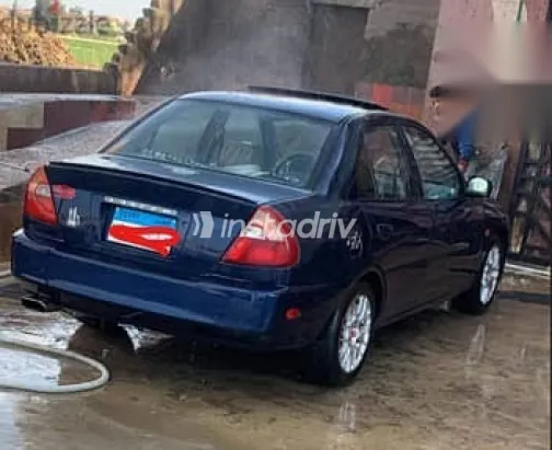 ميتسوبيشي لانسر 1999 أزرق غامق مستعملة للبيع - 5