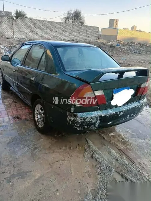 ميتسوبيشي لانسر 1999 أخضر مستعملة للبيع - 2