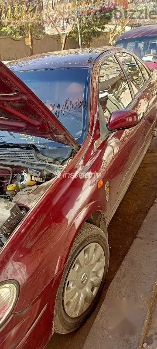 نيسان صنى 2008 أحمر مستعملة للبيع - 2