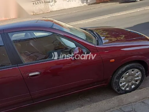 نيسان صنى 2008 أحمر مستعملة للبيع - 6