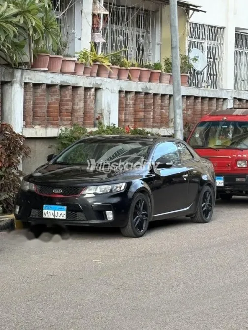 كيا سيراتو كوبيه 2010 أسود مستعملة للبيع - 1