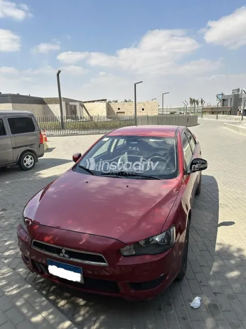 ميتسوبيشي لانسر اى اكس شارك 2016 أحمر مستعملة للبيع - 1