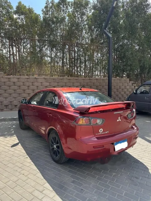 ميتسوبيشي لانسر اى اكس شارك 2016 أحمر مستعملة للبيع - 2