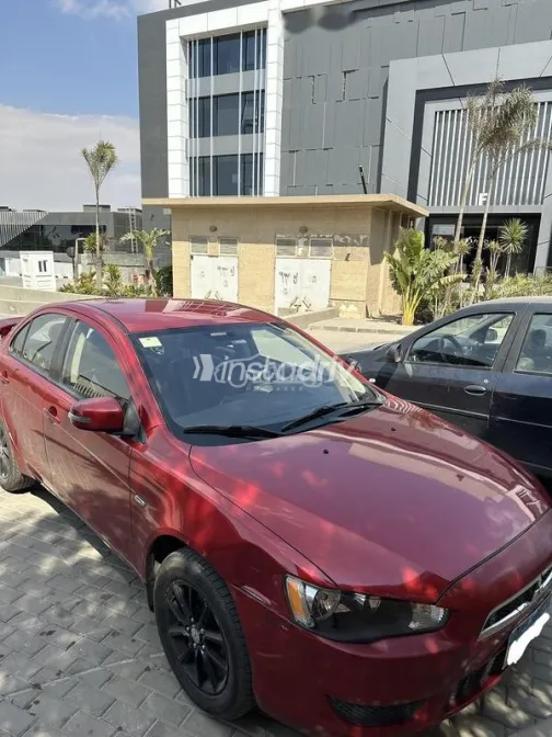 ميتسوبيشي لانسر اى اكس شارك 2016 أحمر مستعملة للبيع - 3