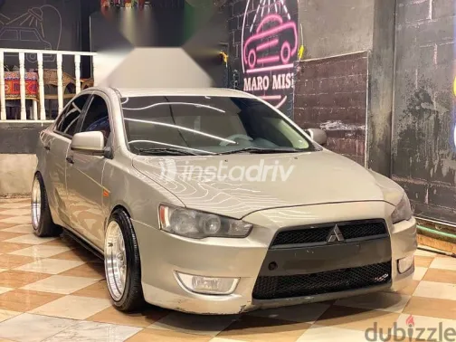 ميتسوبيشي لانسر 2015 فضي مستعملة للبيع - 3