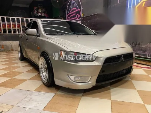 ميتسوبيشي لانسر 2015 فضي مستعملة للبيع - 5