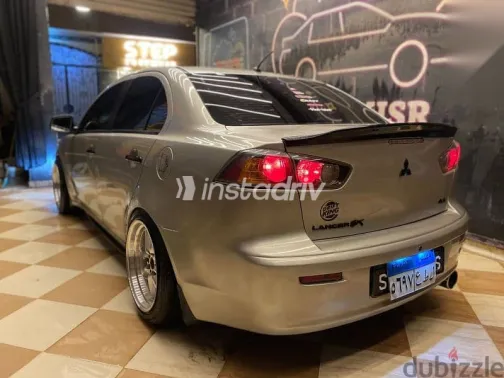 ميتسوبيشي لانسر 2015 فضي مستعملة للبيع - 7