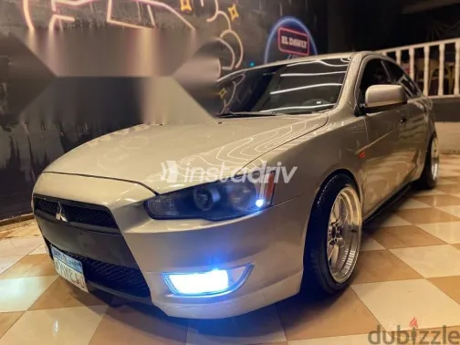 ميتسوبيشي لانسر 2015 فضي مستعملة للبيع - 8